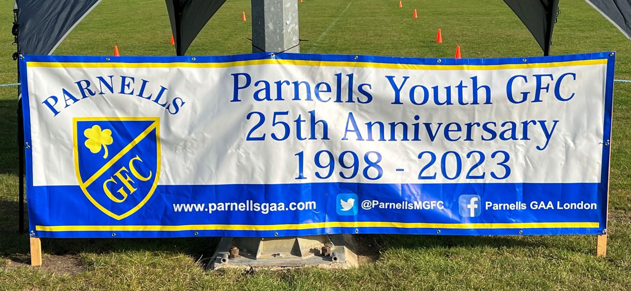 Parnells Youth GFC club poster at a football field